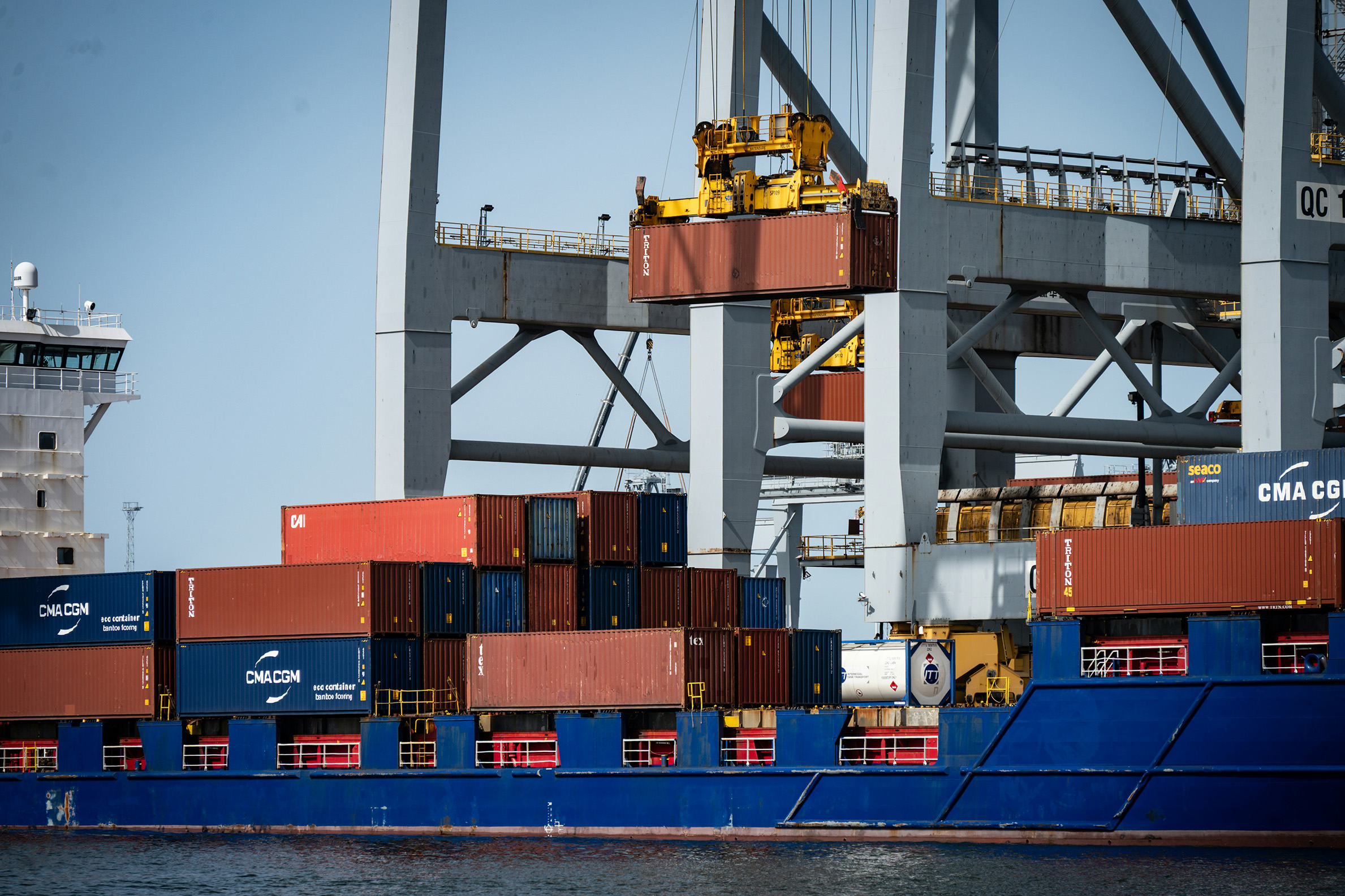 Container crane loading a vessel at an intermodal terminal